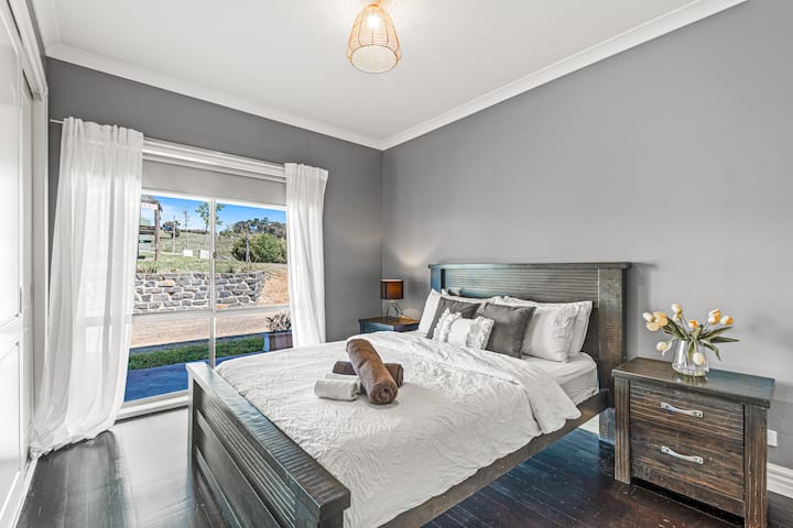 Main farmhouse 3rd bedroom with queen bed