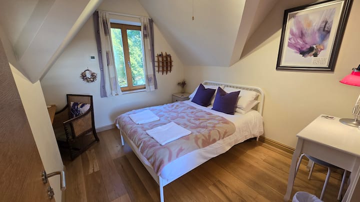 Double bed on first floor with shared shower room next door. 