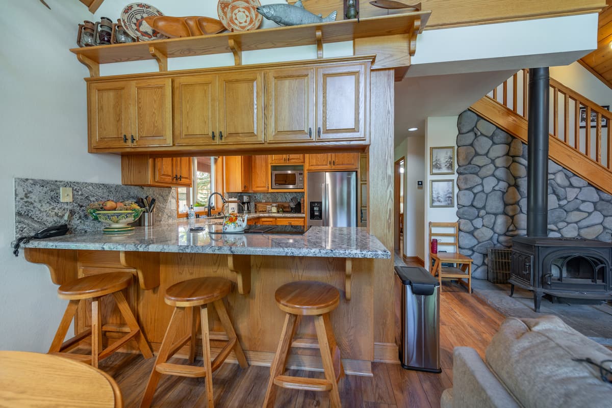 Bar for quick snacks or to provide company and conversation to the cooks.