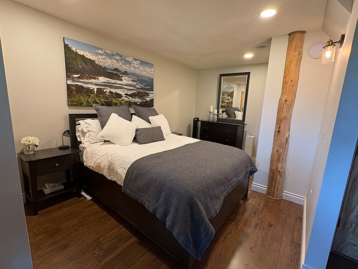 Queen size bed in bedroom. Bedroom is open concept with 3 1/2 walls and no door. Room dividers available for privacy.