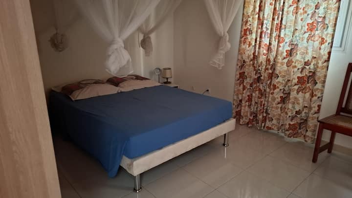 Chambre Hibiscus avec salle de bain attenante