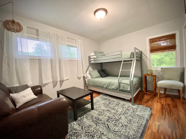 Twin over full bunk bed with twin trundle below. Dimmable light switch. 
