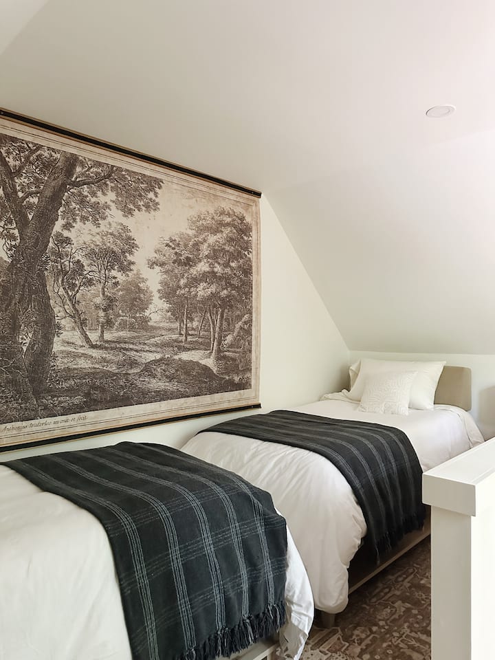 The coziest sleeping nook for two upstairs in the loft. 