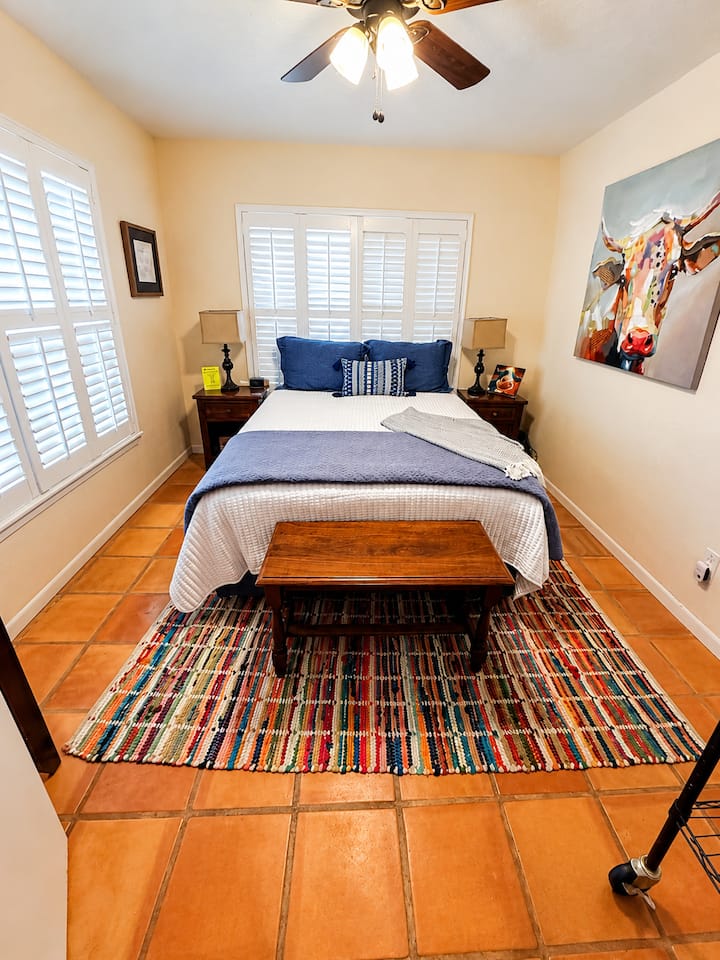 Wake up to sunrise and birdsong! This queen sized bed is super comfy and a Smart TV is also included (not pictured).