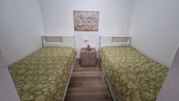 Single room: 2 single beds with anteroom (desk and games)