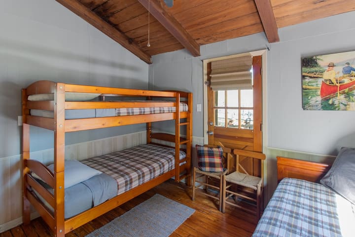 The Bunk room sleeps 4 with a set of bunk beds & a twin daybed with a trundle bed that rolls out