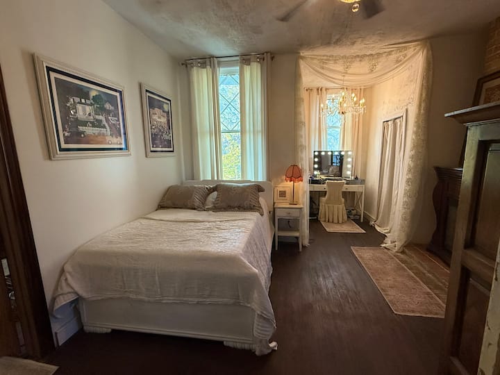 Bedroom 2, full bed and pull out couch with twin mattress, Makeup vanity and electric fireplace.