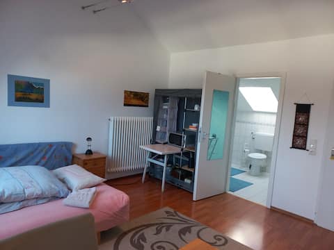 Large bright attic studio