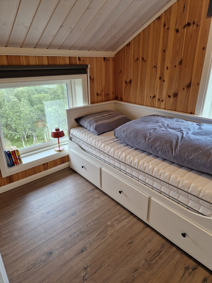 Bedroom with a bed that can be pulled out and can fit 2 