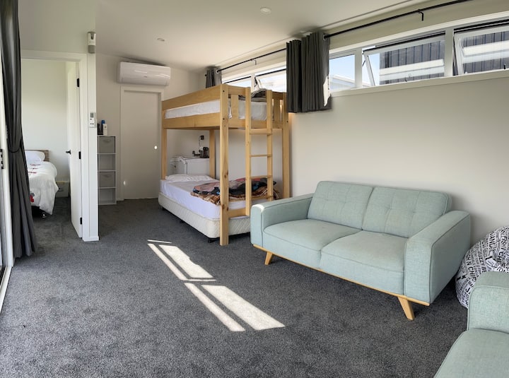 Long Single Loft Bed, and Single bed with trundle single below. 