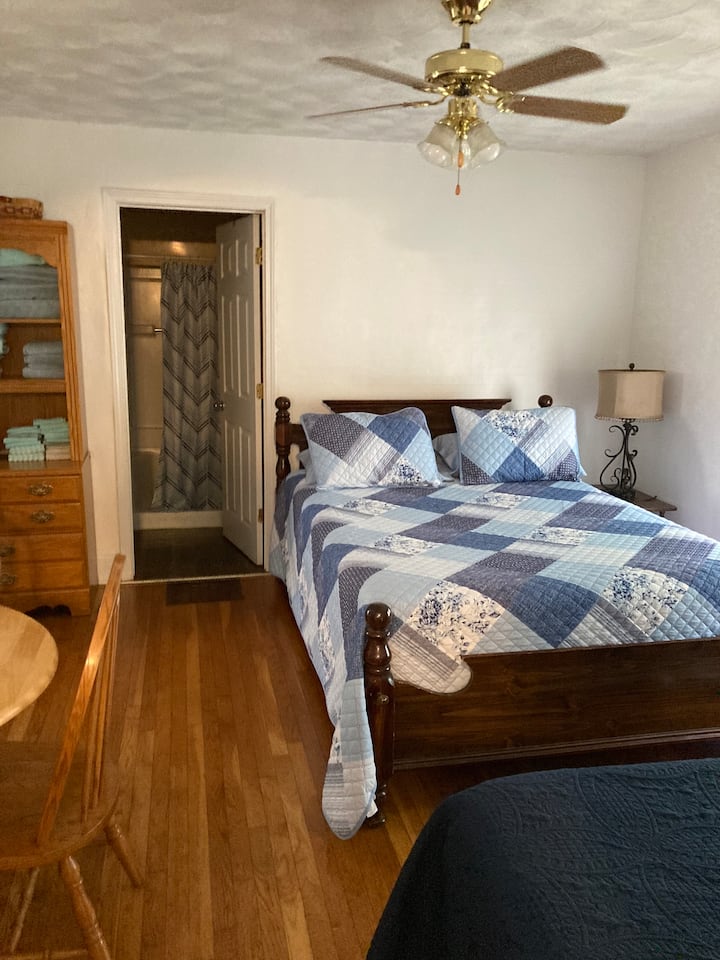 This room is on the first level of house. There is a full bathroom connected which would be private at night. Upstairs has a bathroom for the 2 bedrooms upstairs. This bedroom has a door with a lock for privacy. It has a thermostat, and ceiling fan.