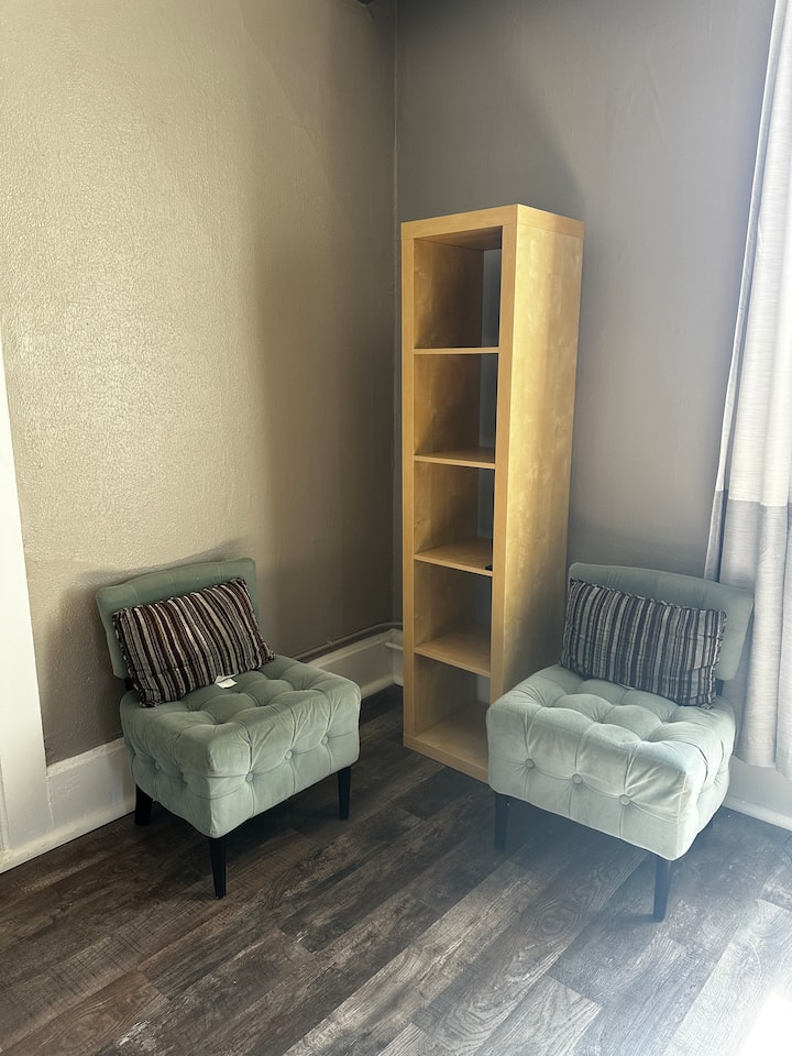 Sitting area in bedroom. 