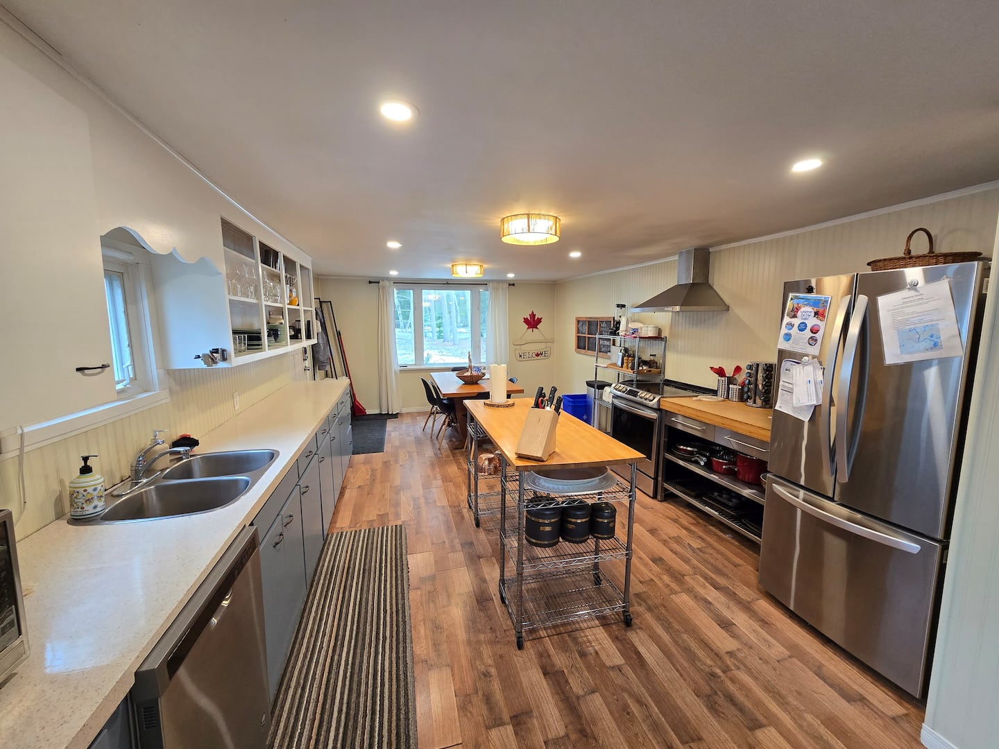 Modern kitchen with butcher block counters and coffee station