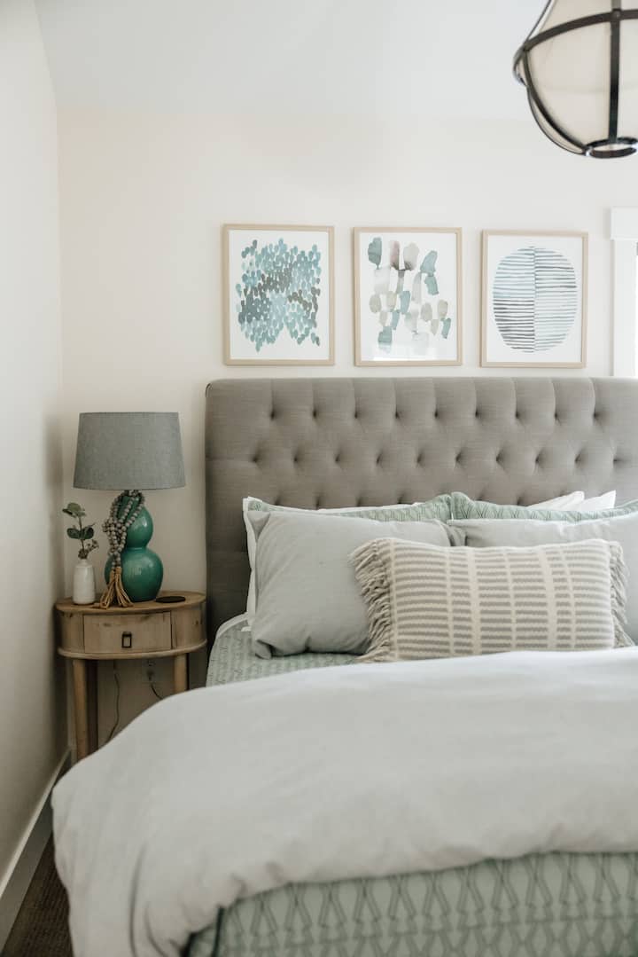 Guest bedroom with Queen bed and luxury linens. This bedroom connects to a shared Jack & Jill bathroom.