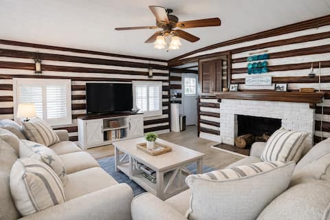 Successful Airbnb property: Steps to Beach - PCB Historic Log Cabin -Sleeps 8. in Laguna Beach