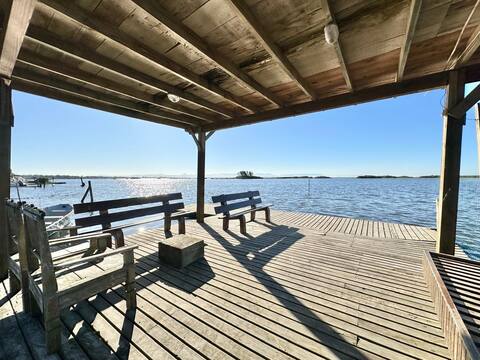 lakeside house with boat ramp