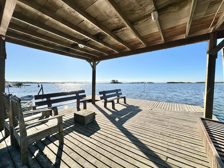 lakeside house with boat ramp