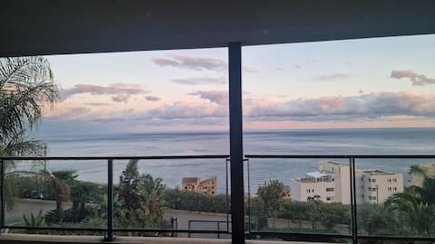 Beautiful new 2-bedroom apartment with 180-degree sea view.