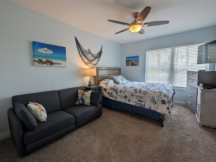 Queen Bed |  Fold Out Couch Sleeps 2 Additional | Smart TV | Gaming Console | Clothing Storage