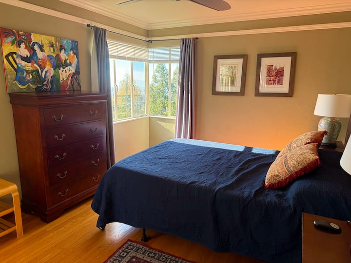 Master bedroom with amazing bay views and sunset view in the evening.