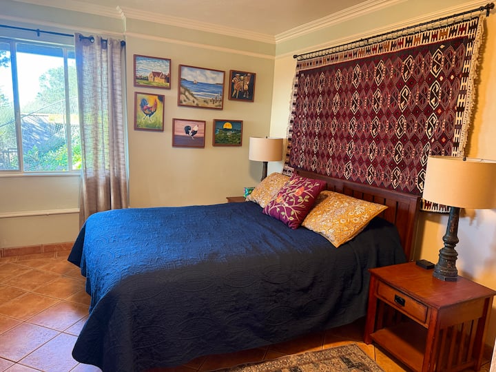 The 5th bedroom is downstairs and offers direct access to the lower patio!