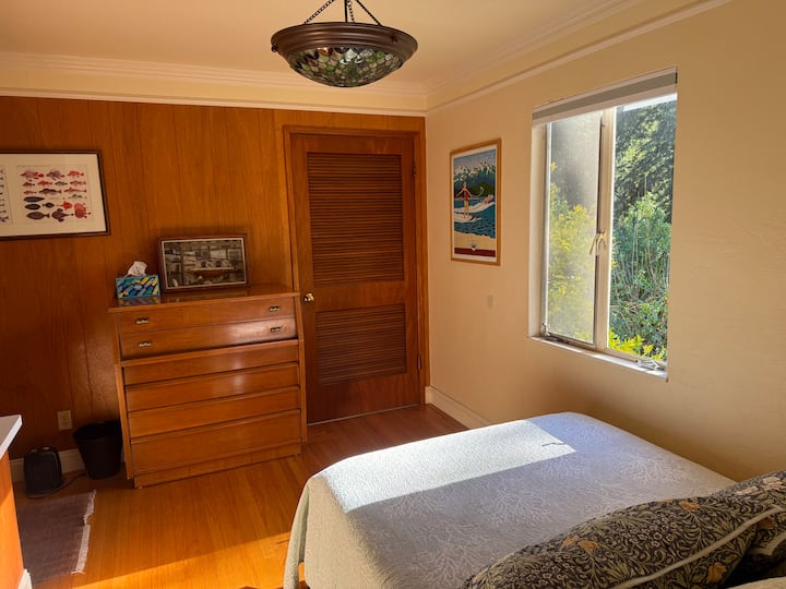The 4th bedroom is downstairs and has a dedicated workspace.