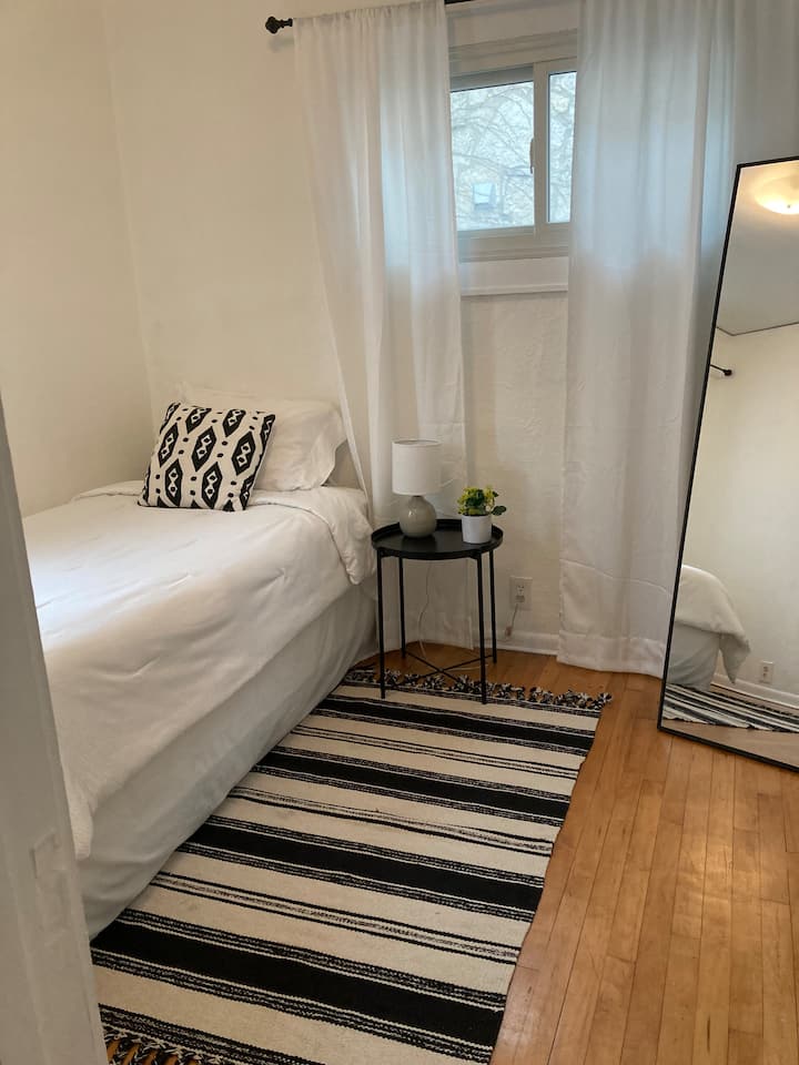 Bedroom located on the main floor with a twin bed.