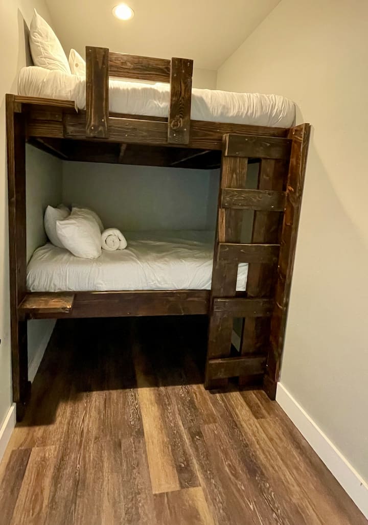 Upgrade! 2 full size bunks 