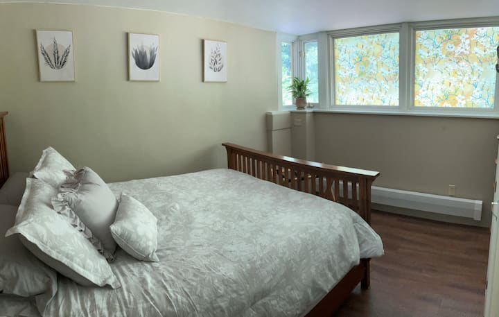 New, comfortable queen size room includes luggage rack, closet space, and dresser. Beautiful view of the woods and often wildlife. 