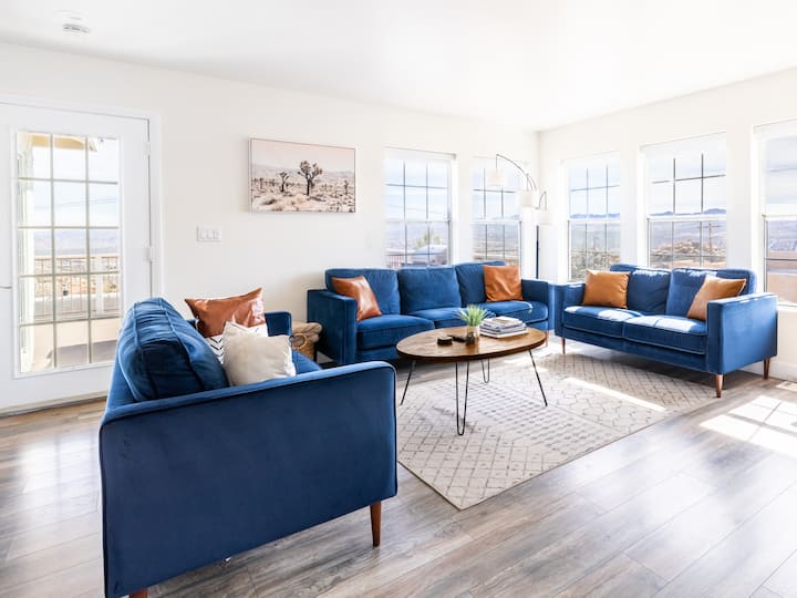 Snuggly velvet couches, cozy TV nights, and sunrise-to-sunset views await you.