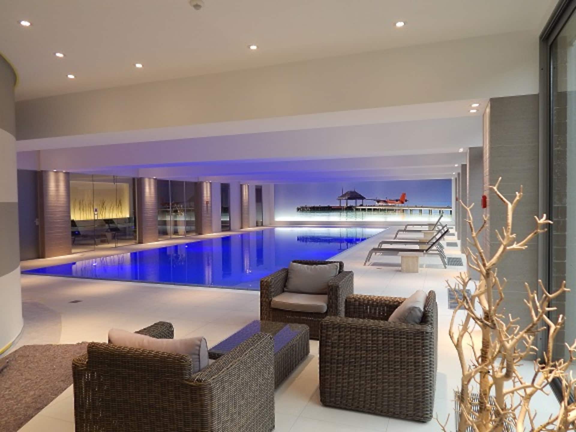 Hotel room with pool and fitness access