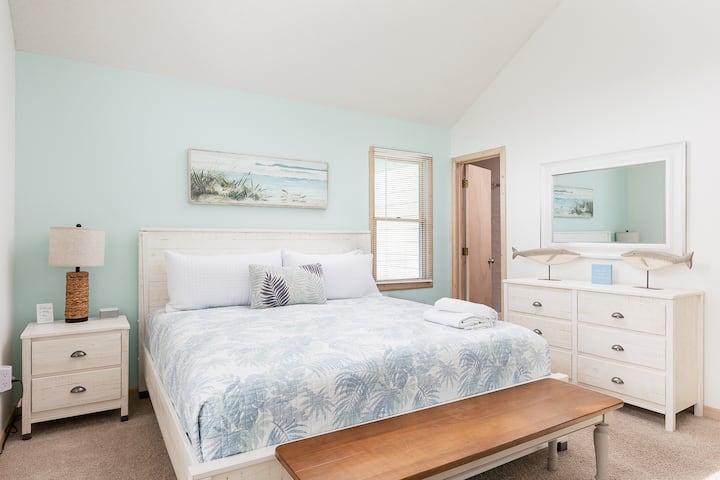 Bedroom 1 (king) is on the top level and includes an attached full bath.