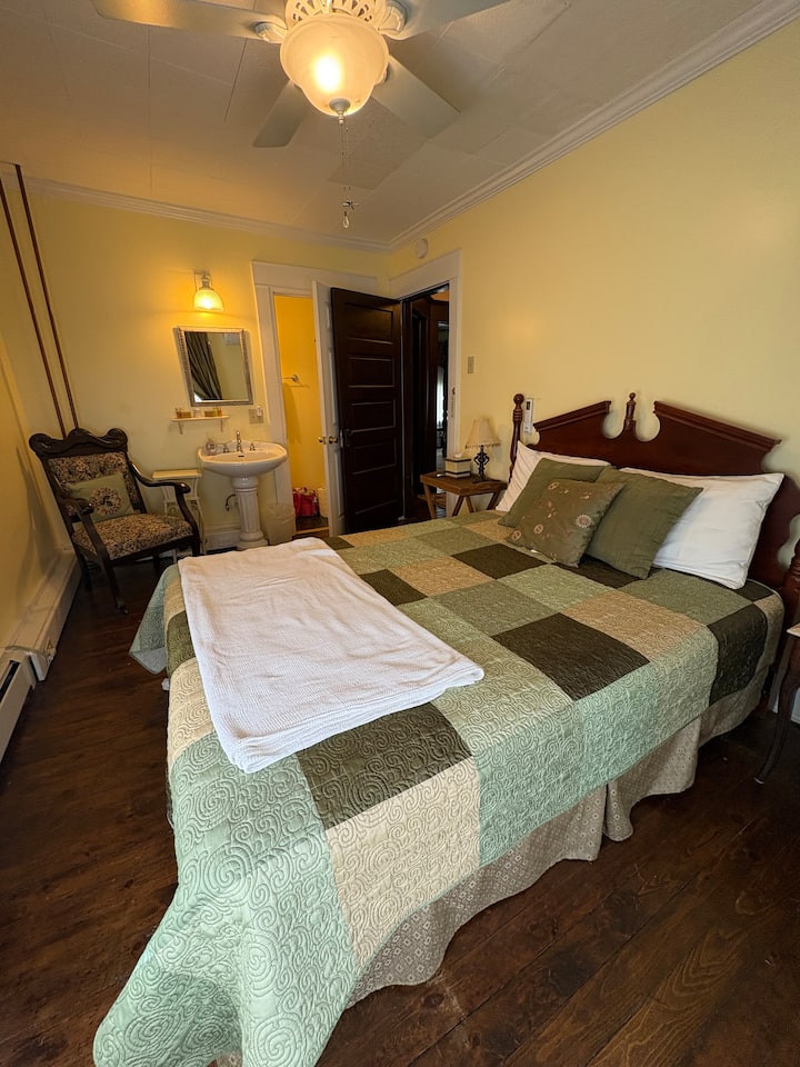 The Laurel Hill room with a queen bed and private bath.