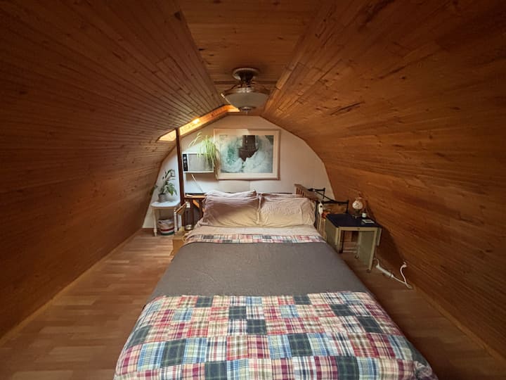 Restful nights in a comfortable bedroom, ideal for solo adventurers  or duos seeking a peaceful escape and place to connect.