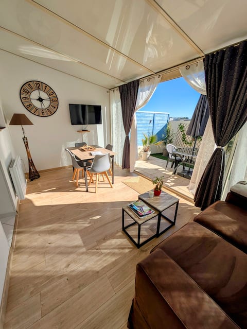 Maisonette with patio and large bedroom.