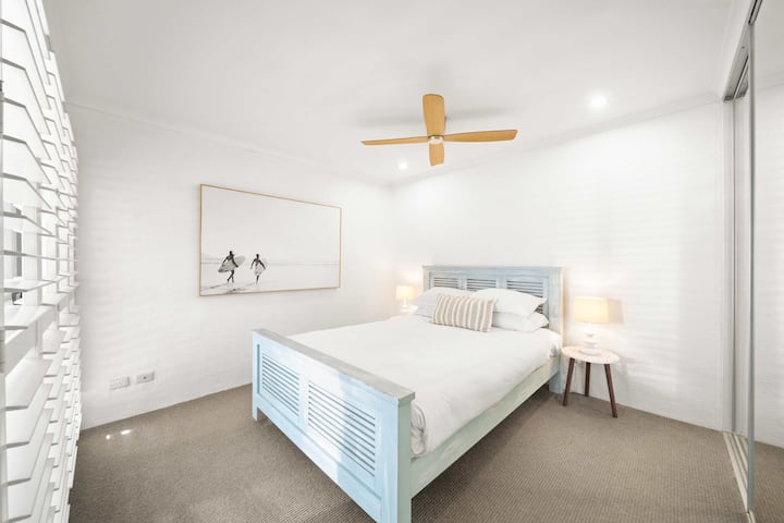 Retreat to the peaceful master bedroom featuring a queen bed and private ensuite.