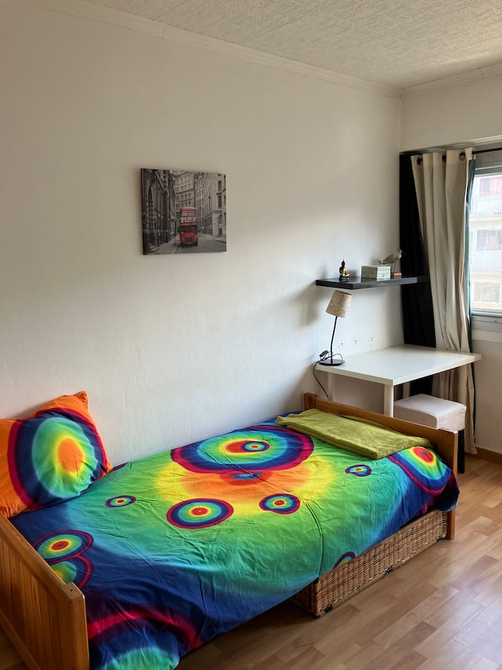 Bedroom 2  with a single bed and an extra single bed.