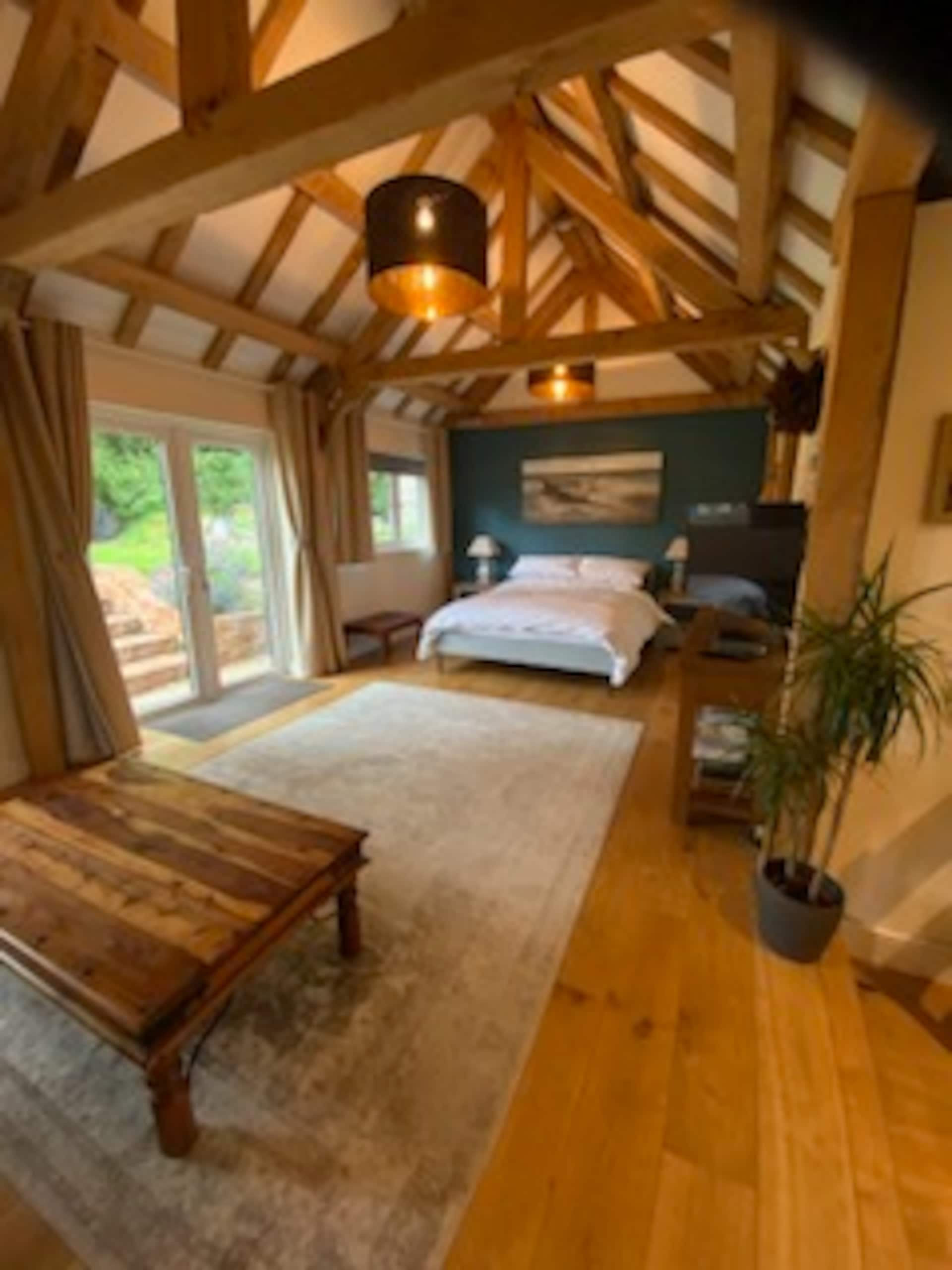 A delightful oak-framed studio, own entrance.
