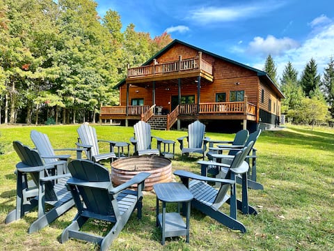 Torch Lake Views | Trails & Fire Pit | Sleeps 8