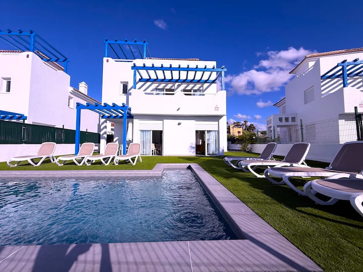 Villa 5 · Green Princess, Amarilla Golf — pool terrace with sun loungers