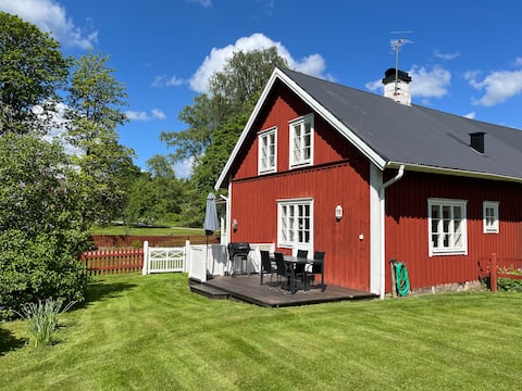 Svartarp Rural accommodation near lake.