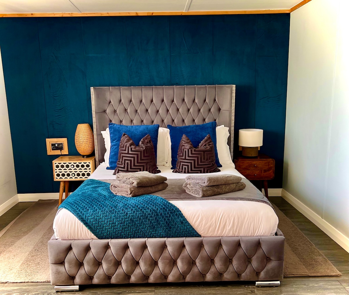 Spacious master bedroom designed for a restful nights sleep, kingsize bed with hotel quality bedding.