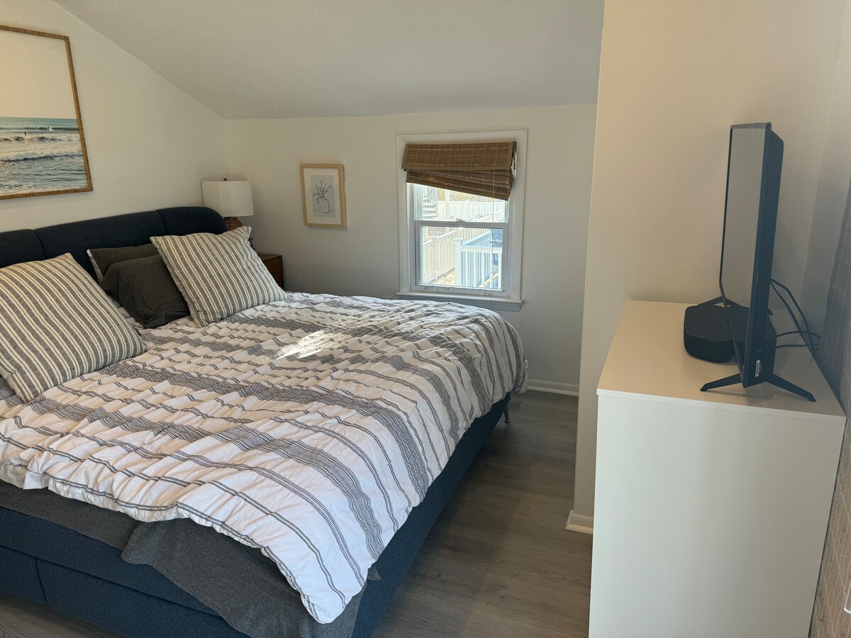 Chumba cha kulala cha kiwango cha juu kilicho na kitanda aina ya king