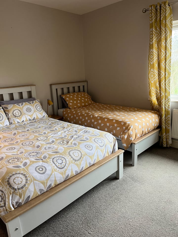 Double and Single bed
Wardrobe and hair dryer.  