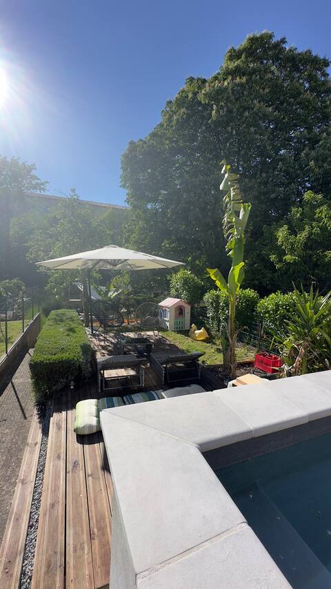 Riverside house with pool in town