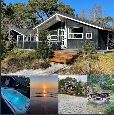 Family summer house in the woods by the water with jacuzzi