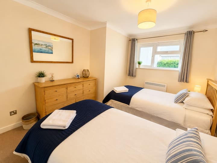 The third bed is a pull out bed from one of the singles , more suitable for a child.