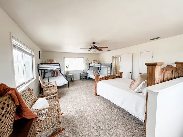 The fun bunk room where the kids, or even bachelorette or bridesmaid groups love to gather to make it feel like a slumber party! This room has two twin over full bunk beds plus a Queen bed with an extremely comfortable mattress.