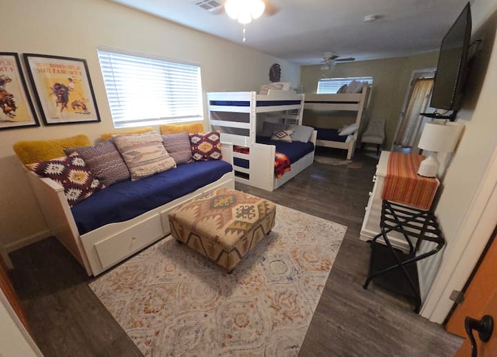 Cowboy themed bunk room hang out for the kids with plenty of places to sleep. Three new mattresses