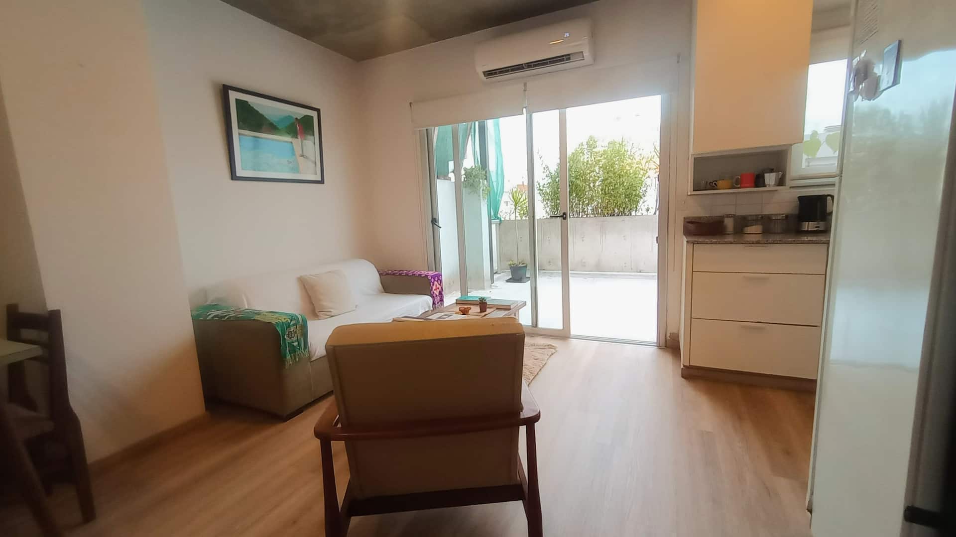 A bright loft, private terrace, and grill